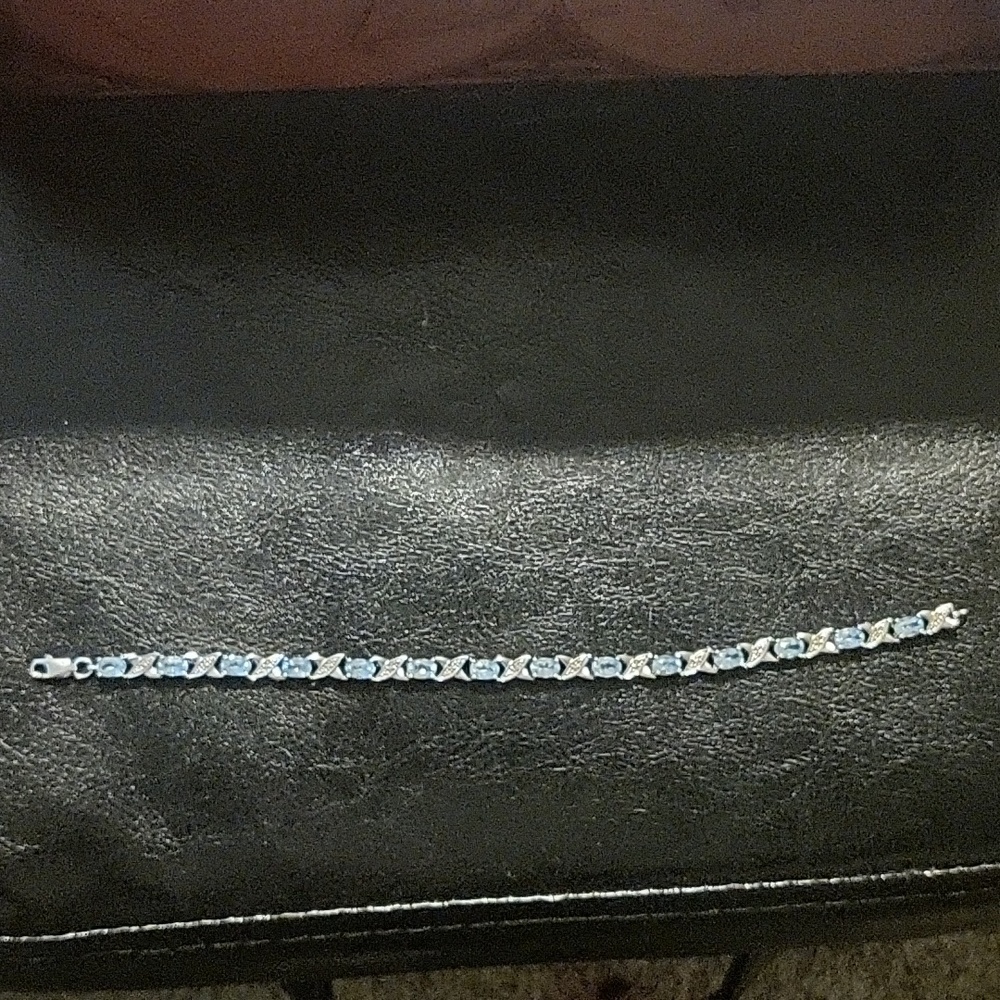 Blue topaz and Diamond Hugs and Kisses Bracelet